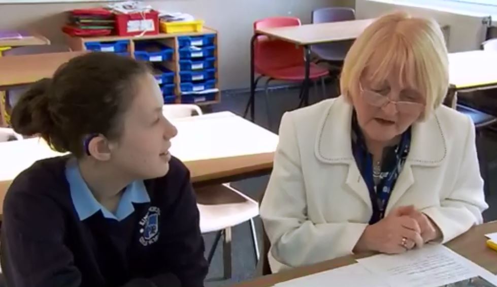 Student listening to a reader