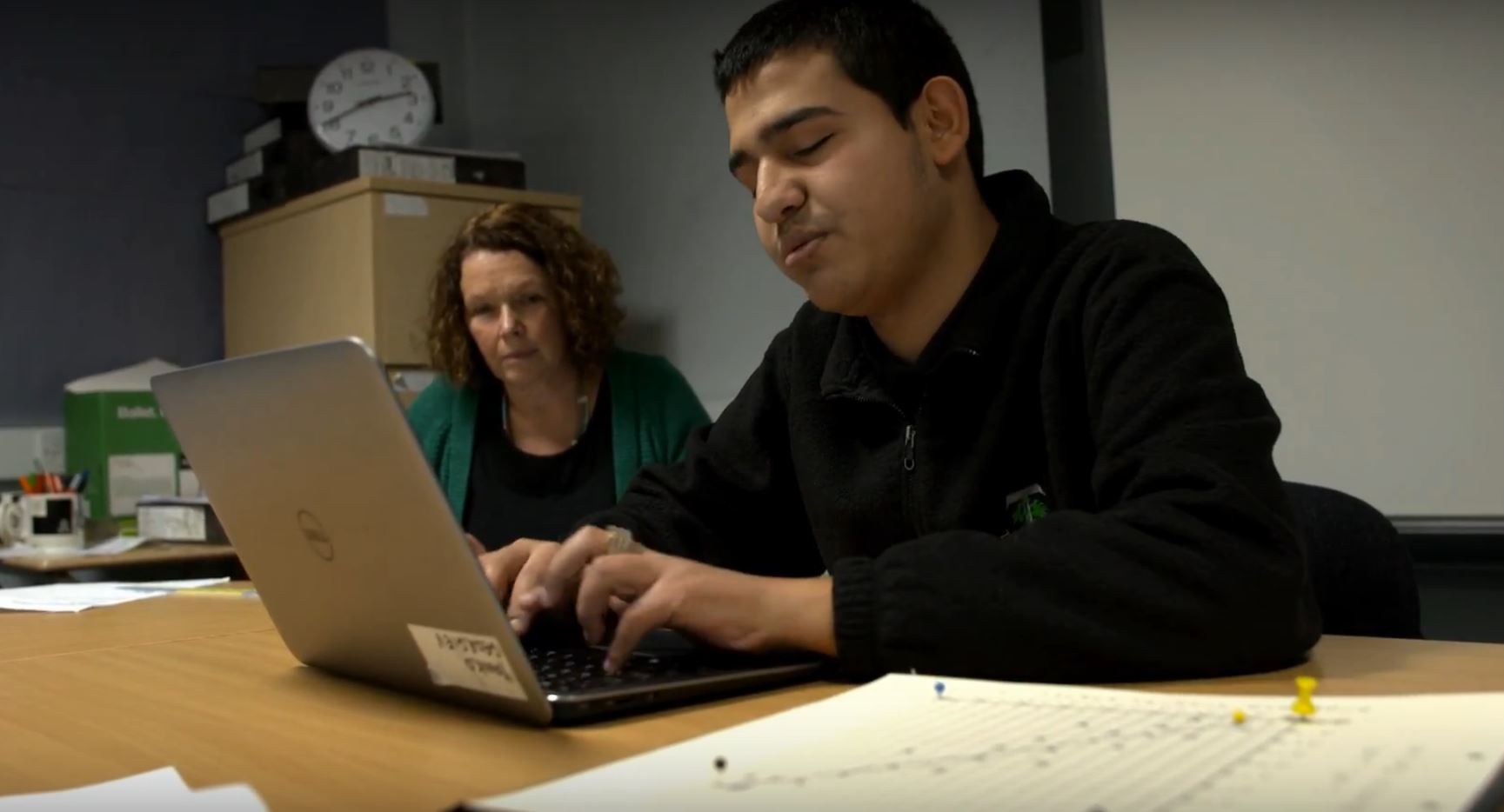 candidate in separate room with invigilator